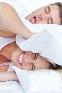 Women bothered by her partners sleep apnea